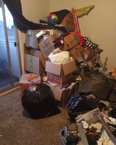 house we bought in Pueblo with Junk in it